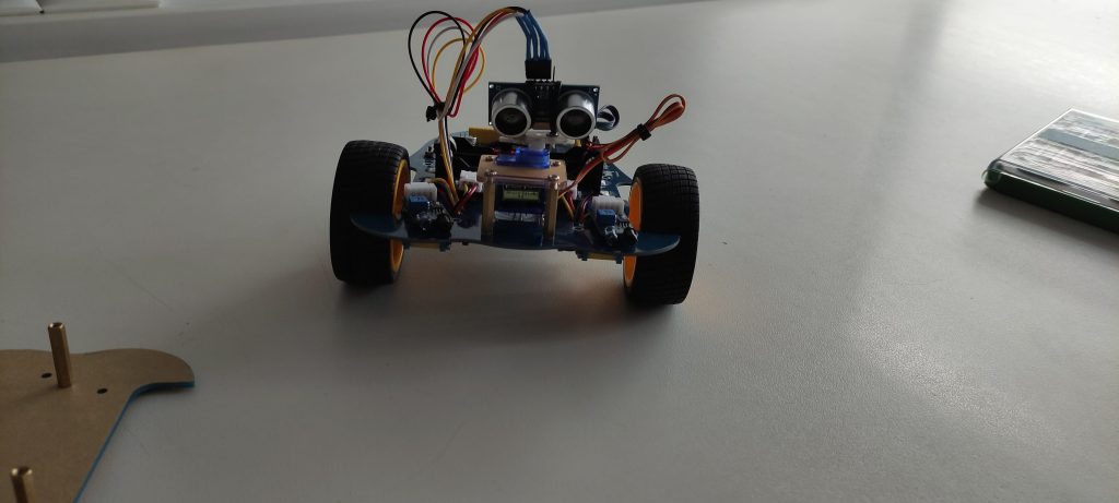 Small wheeled robot car on the floor