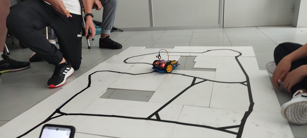 Robot car following a track taped to the floor