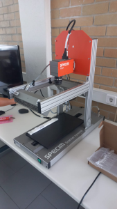 Hyperspectral lab scanner on a bench, with its aluminium frame